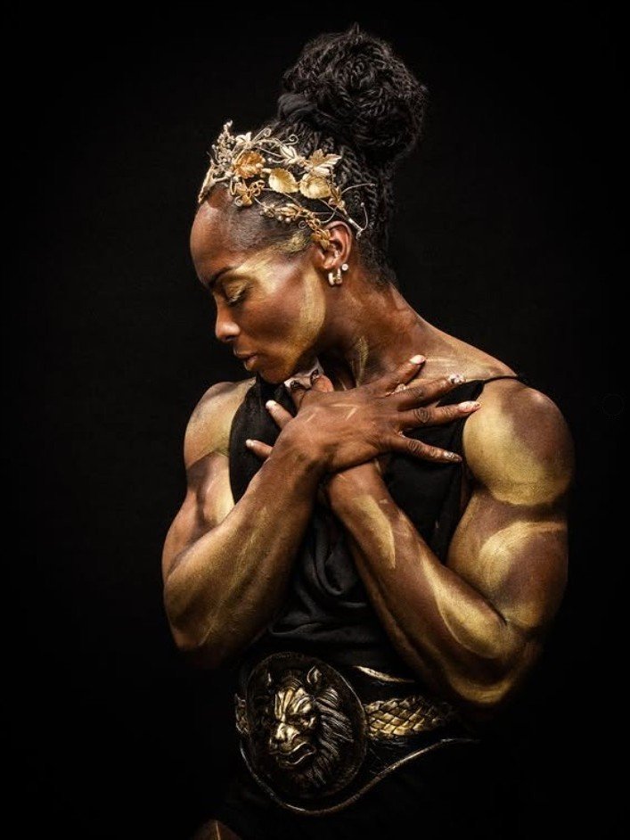 Michelle Shelly Mensah in a gold editorial modelling portrait